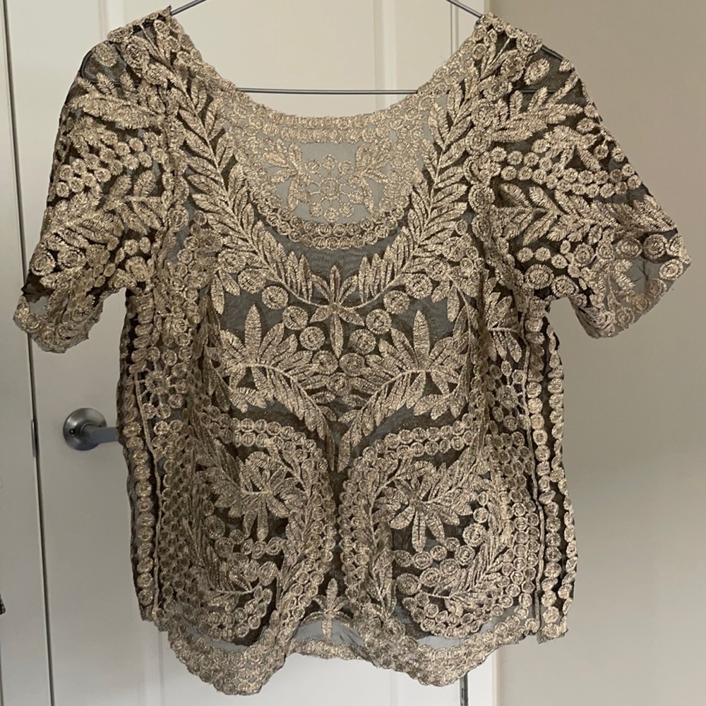 Gold and sheer knit tshirt.